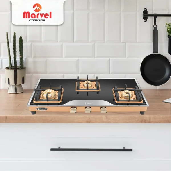 Cooktop Marvel – 3 Burner Premium LPG Gas Stove | Elite Mirror Glass, Rose Gold SS Mirror Frame, Square Pan Support | Brass Top (BEAST – 3503)