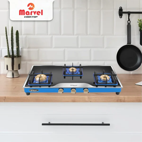 Cooktop Marvel – 3 Burner Premium LPG Gas Stove | Elite Mirror Glass, Blue SS Mirror Frame, Square Pan Support | Brass Top (BEAST – 3503)